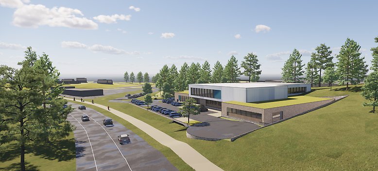 Visionsbild över det nya djursjukhuset, vy från sydost med Viksjöleden i förgrunden.